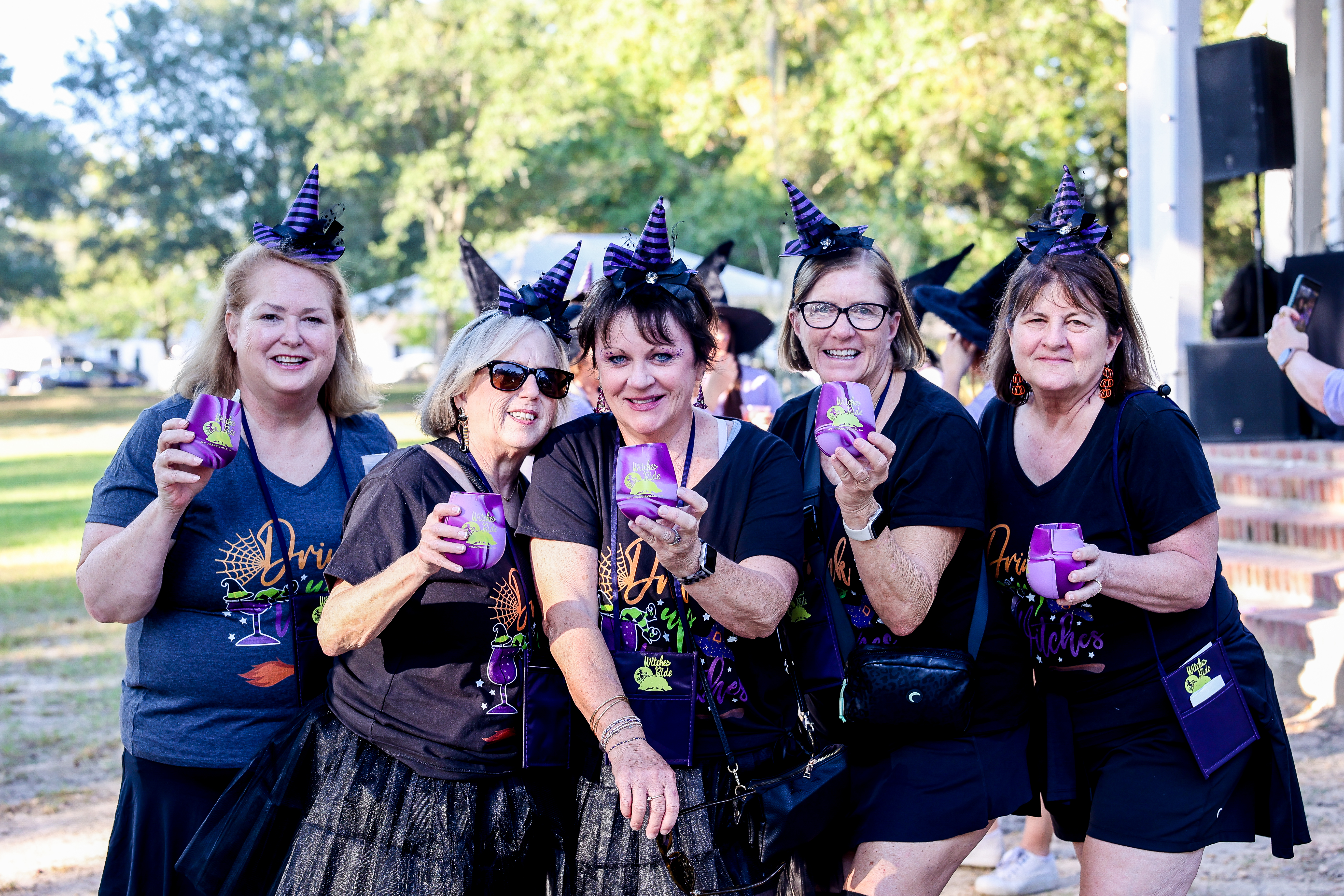 Costumed group celebrating at The Witches Ride of St. Francisville