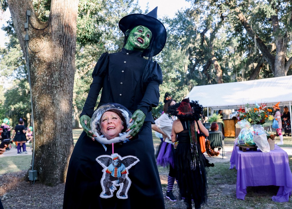 Friends in witch costumes at The Witches Ride of St. Francisville
